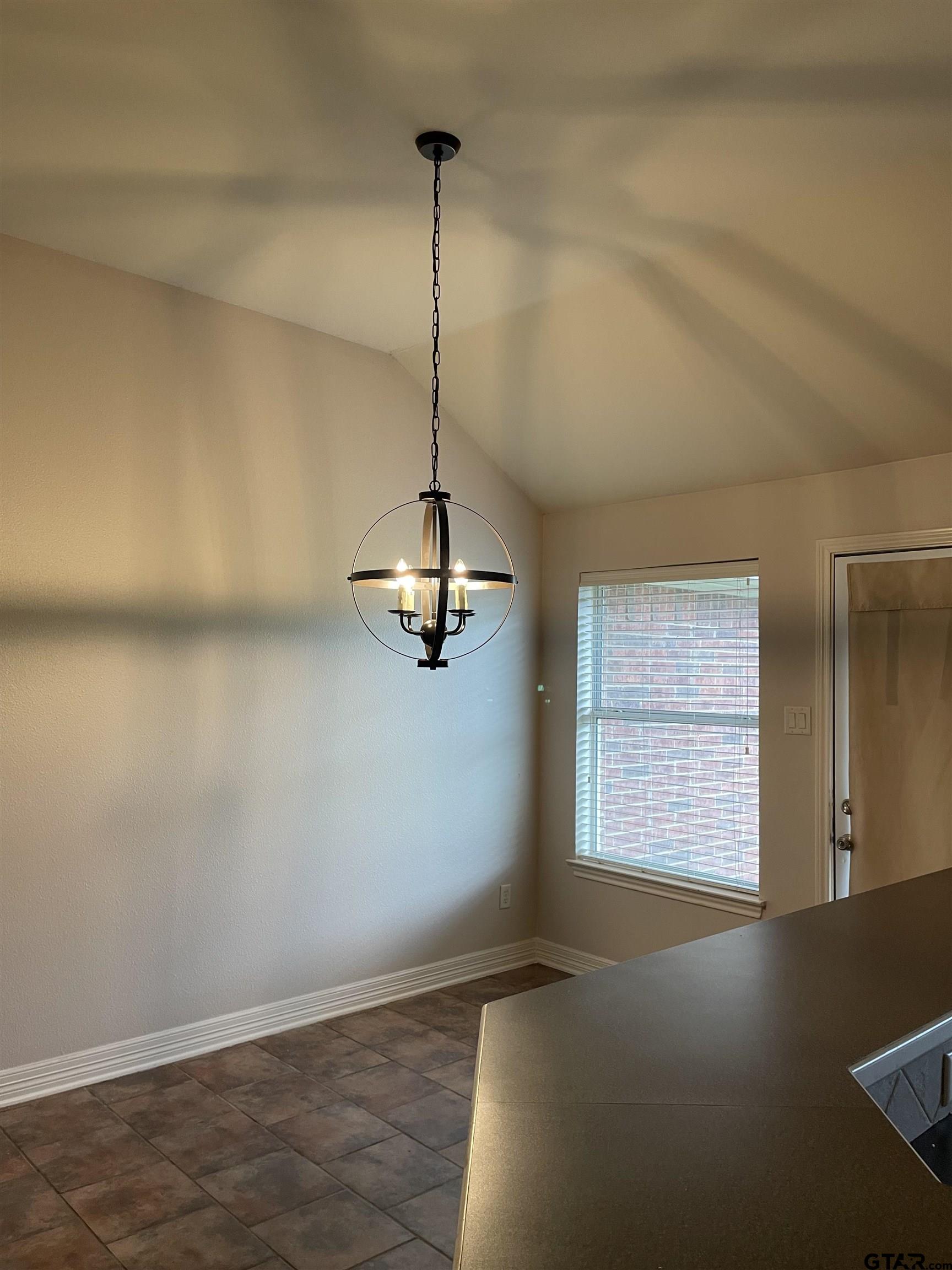 213 Cass Circle Tyler, TX 75703 - Photo 10 of 44 a view of empty room with windows