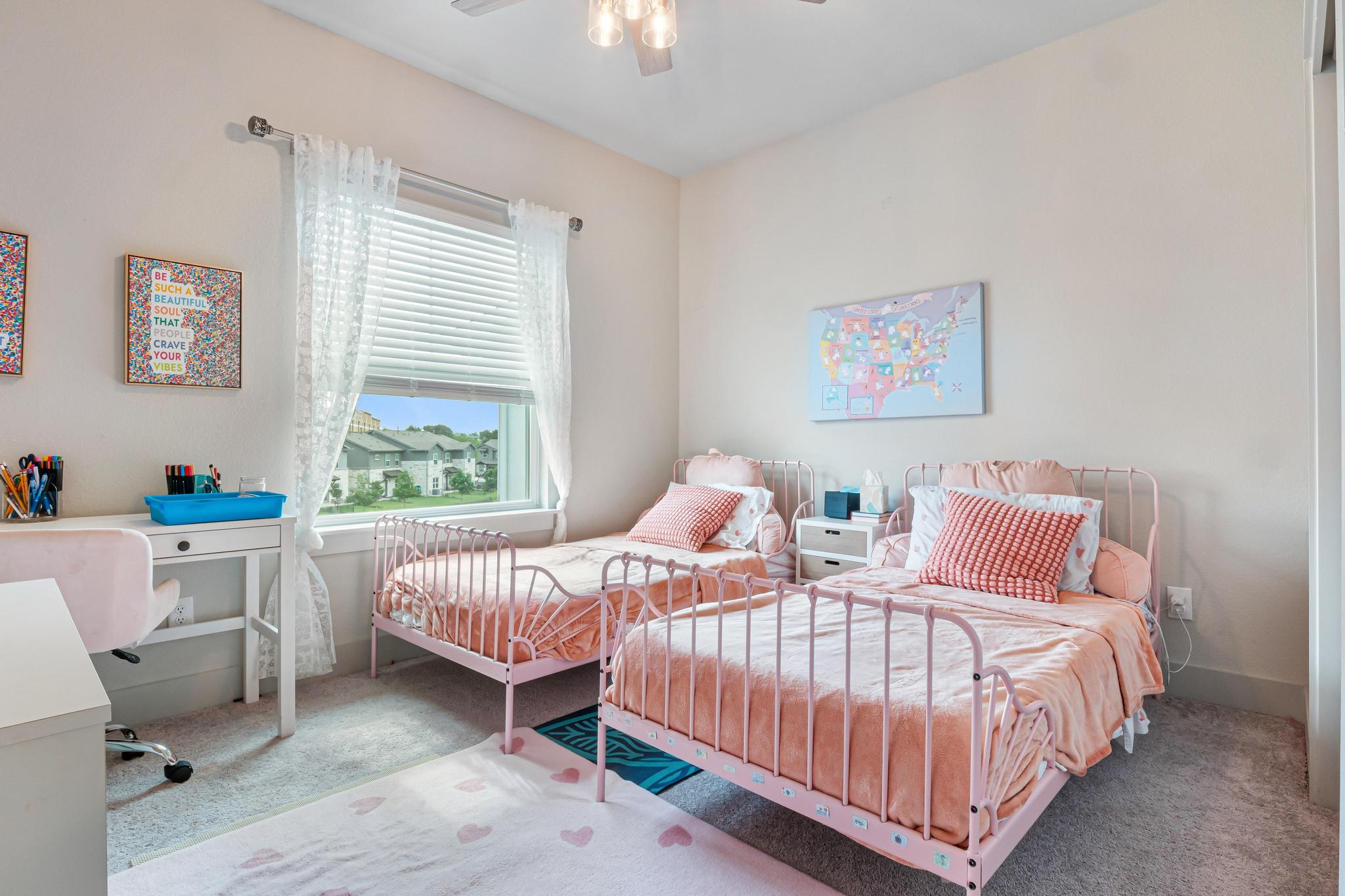 2301 Local Rebel Street Leander, TX 78641 - Photo 19 of 21 a bedroom with two beds and a window