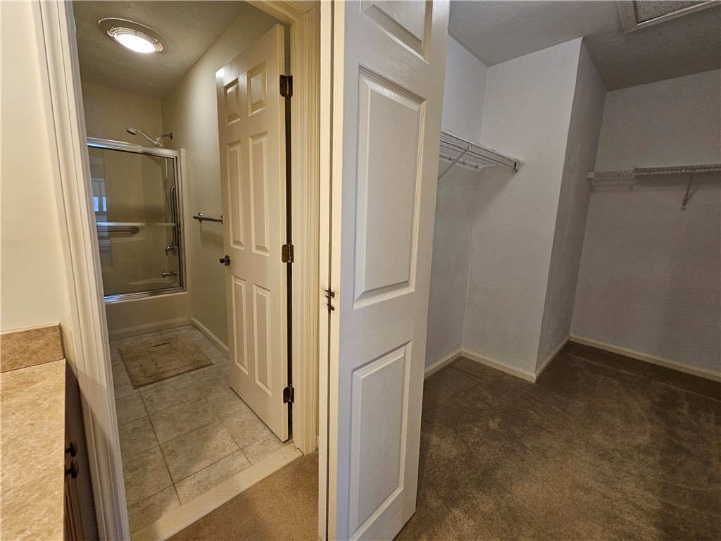 2970 Mendon Road, Unit 187 Cumberland, RI 02864 - Photo 24 of 34 Primary Bedroom Bathroom & Walk-In Closet