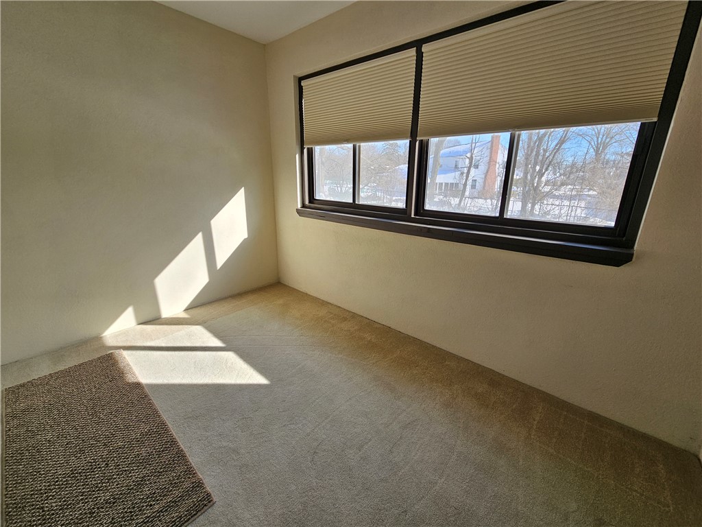 2970 Mendon Road, Unit 187 Cumberland, RI 02864 - Photo 26 of 34 Primary Bedroom Enclosed Porch