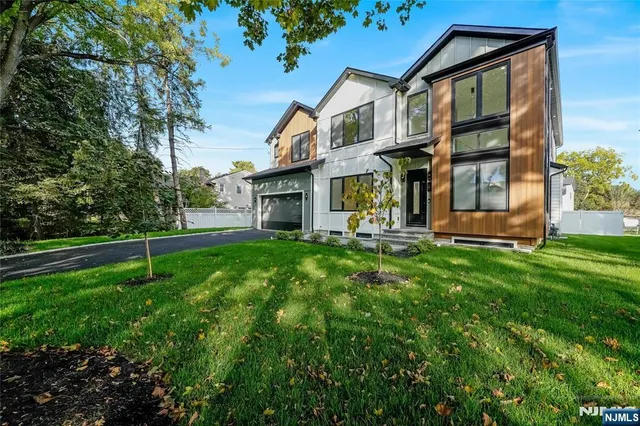 a house view with garden space