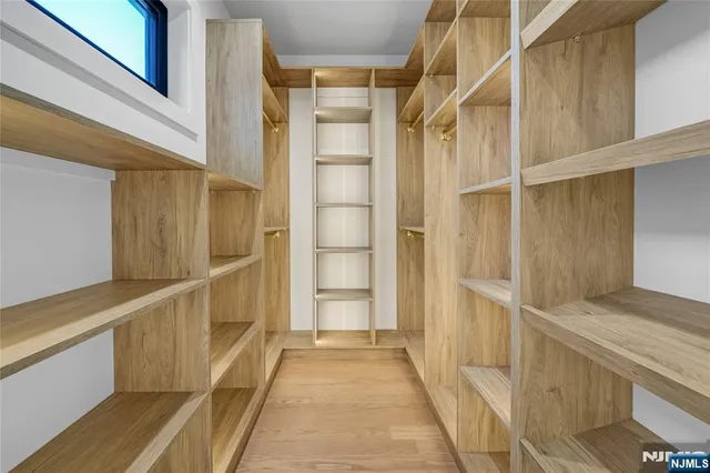 a view of an empty walk in closet