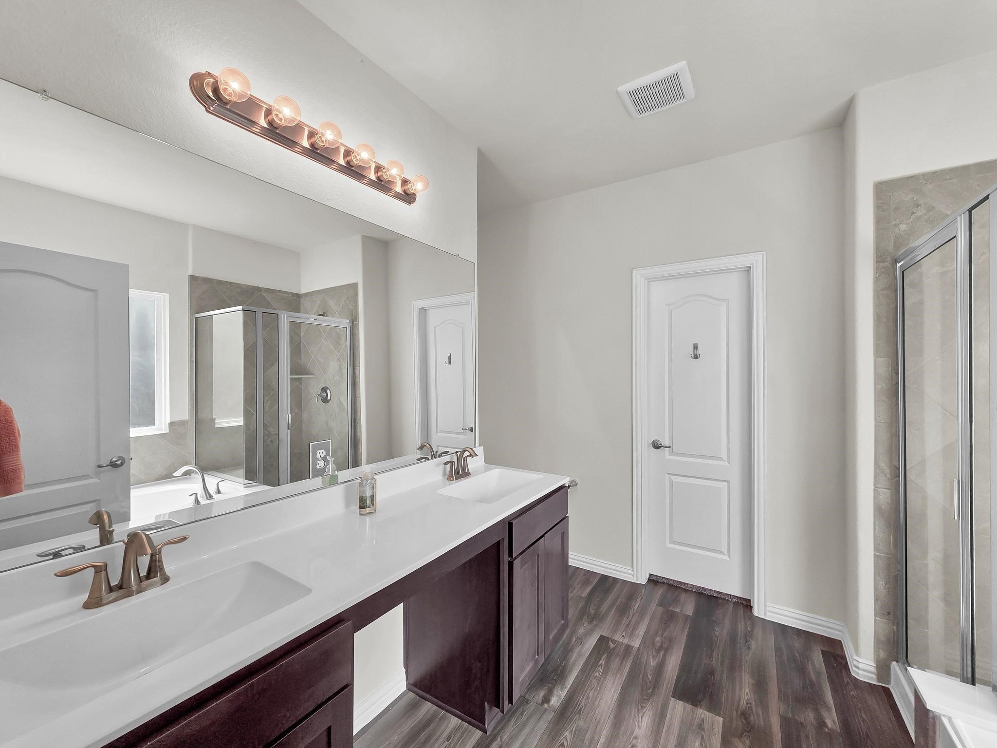 398 Shoreview Drive Conroe, TX 77303 - Photo 19 of 33 Vanity space in the light and bright en-suite