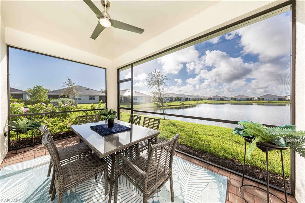 882 Enbrook Loop Naples, FL 34114 - Photo 7 of 19 a view of a balcony with furniture