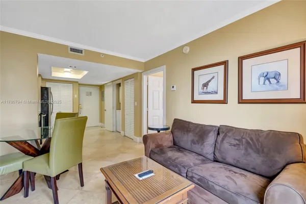 a living room with furniture and a couch