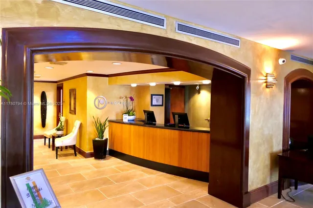 a view of a living room and bathroom