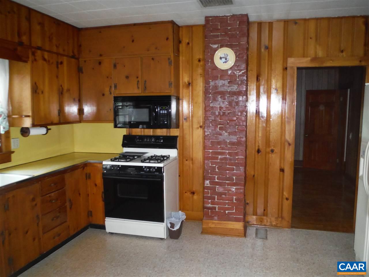1270 Locust Grove Church Road Orange, VA 22960 - Photo 22 of 46 a kitchen with stainless steel appliances granite countertop a stove and a refrigerator