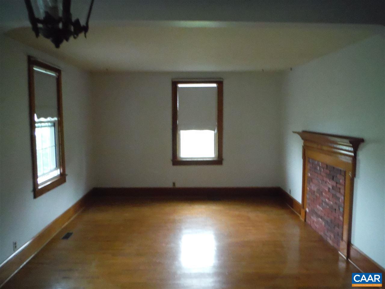 1270 Locust Grove Church Road Orange, VA 22960 - Photo 29 of 46 a view of an empty room with a window and wooden floor