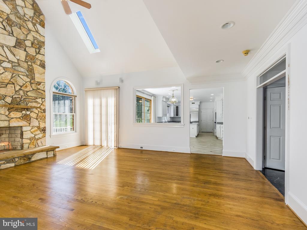 8951 Brook Road McLean, VA 22102 - Photo 11 of 32 a view of empty room with wooden floor and fan