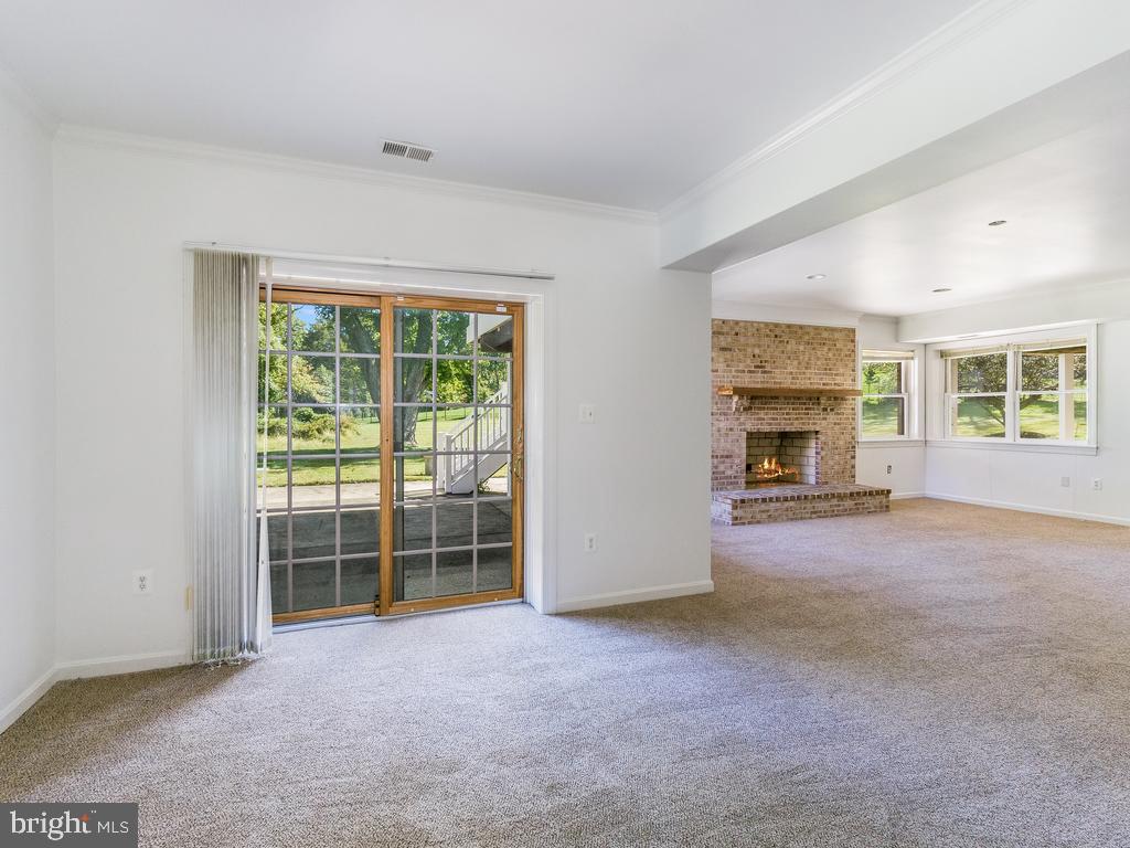 8951 Brook Road McLean, VA 22102 - Photo 26 of 32 a view of empty room with a fireplace
