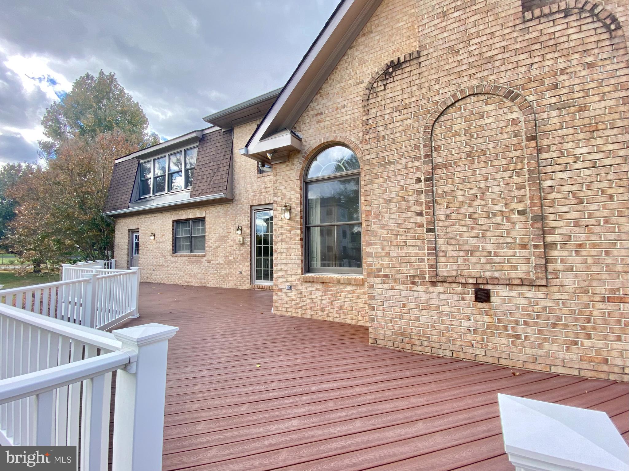 8951 Brook Road McLean, VA 22102 - Photo 31 of 32 a front view of a house with wooden stairs