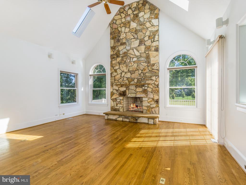 8951 Brook Road McLean, VA 22102 - Photo 9 of 32 a view of an empty room with a window and a bathroom