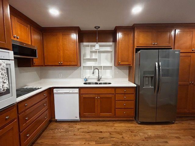 2744 Hunting Hill Lane Decatur, GA 30033 - Photo 16 of 16 a kitchen with stainless steel appliances granite countertop a refrigerator and a sink