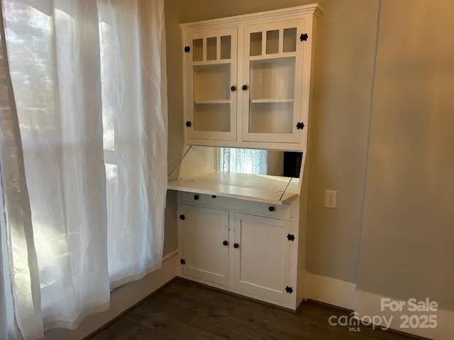 a bathroom with a sink and mirror