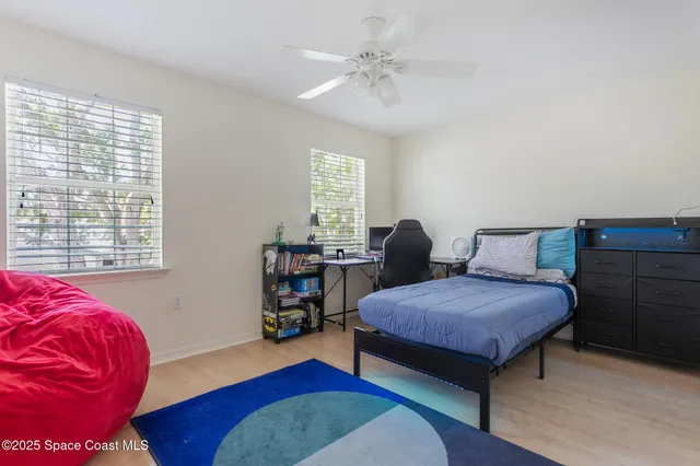 a bathroom with a sink vanity and a mirror