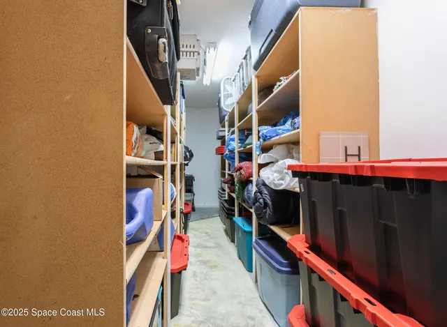 a view of a patio with table and chairs potted plants with wooden floor
