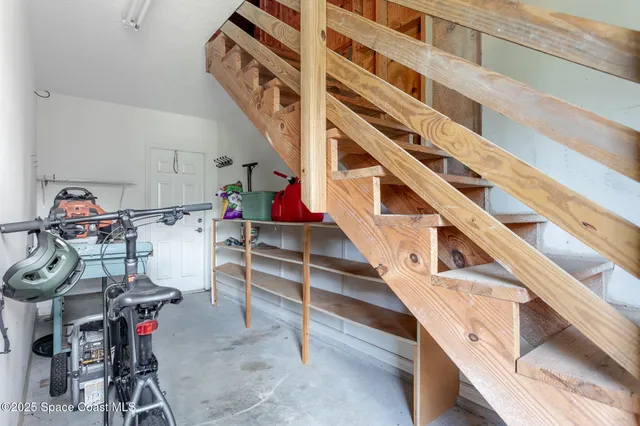 a view of a swimming pool with outdoor seating