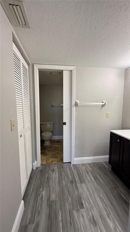 175 Kings Highway, Unit 1126 Punta Gorda, FL 33983 - Photo 10 of 17 a view of a room with wooden floor