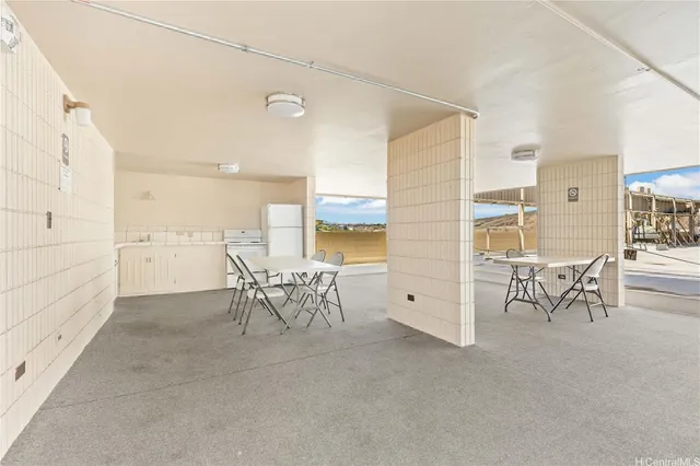a view of a livingroom with furniture and chandelier