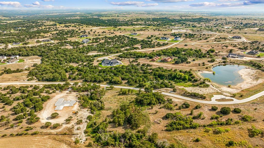3111 Rio Grande Circle Cresson, TX 76035 - Photo 17 of 20 Aerial view of property and surrounding area with a nearby body of water and rural landscape