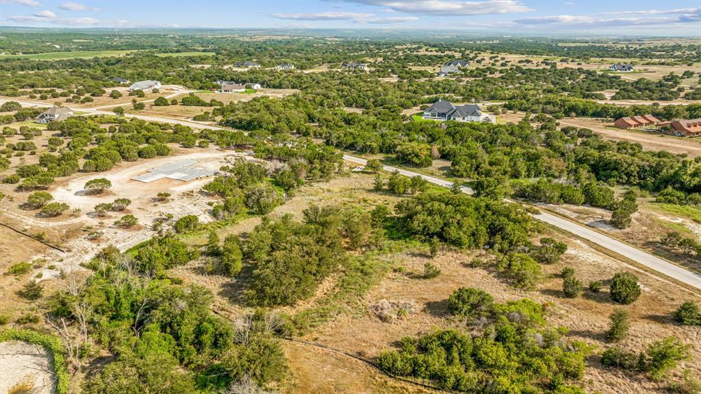 3111 Rio Grande Circle Cresson, TX 76035 - Photo 18 of 20 Aerial view of property and surrounding area with a tree filled landscape