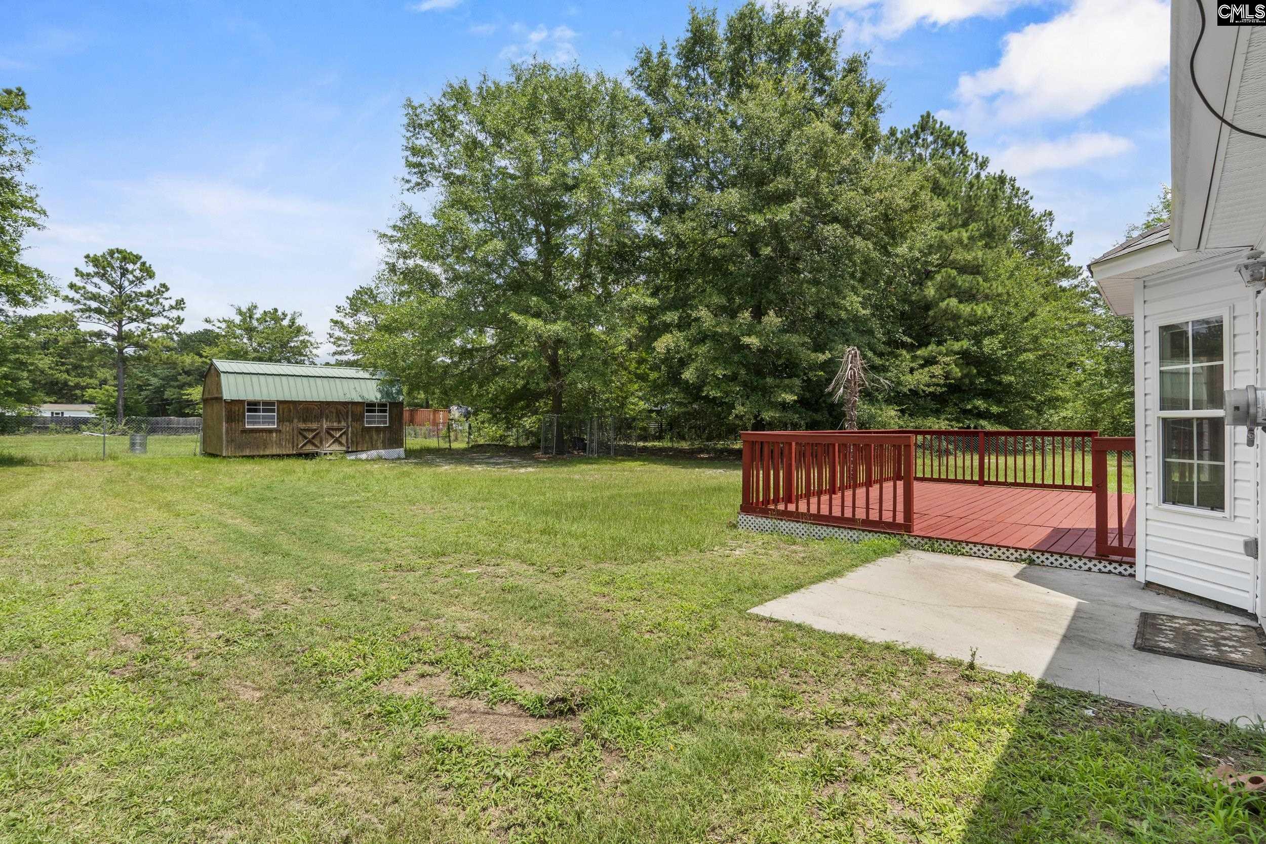 548 Eskie Dixon Road Elgin, SC 29045 - Photo 25 of 27 a view of a park with large trees