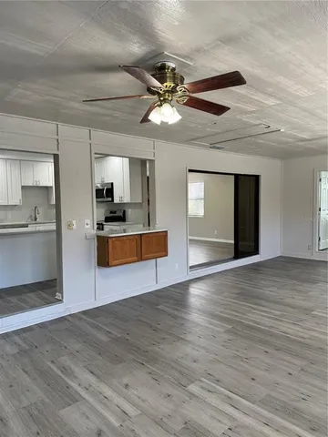 a view of an empty room and window
