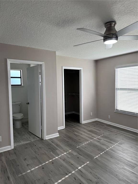 4550 Ewell Road Lakeland, FL 33811 - Photo 22 of 49 a view of an empty room with a window