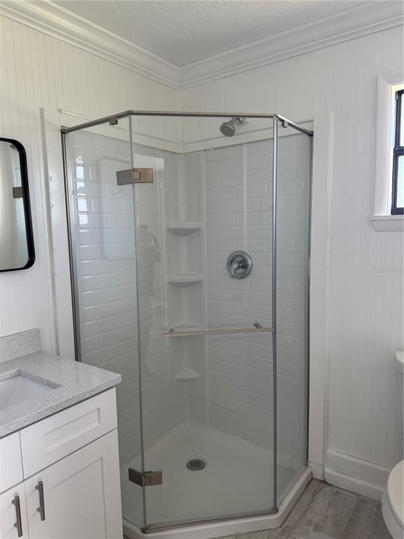 4550 Ewell Road Lakeland, FL 33811 - Photo 24 of 49 a bathroom with a shower toilet and sink