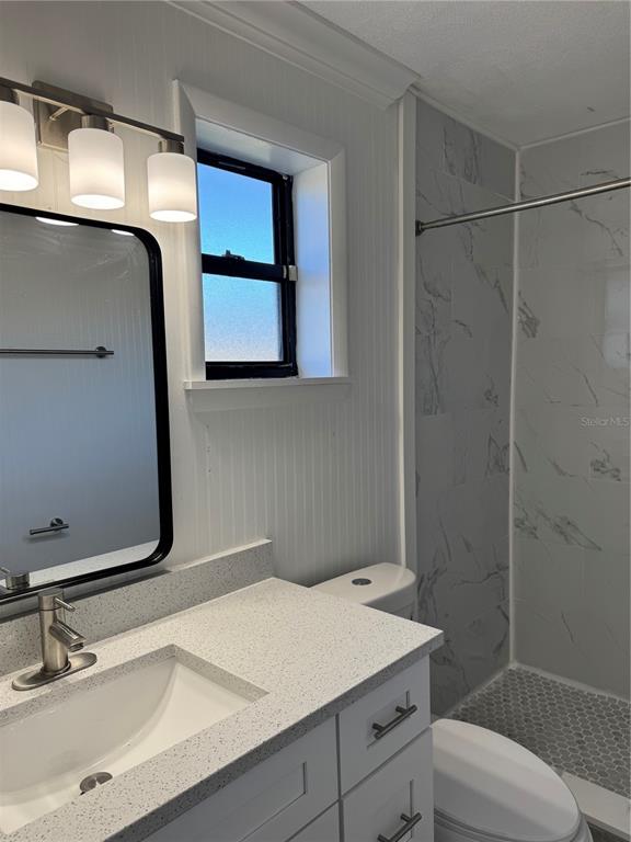 4550 Ewell Road Lakeland, FL 33811 - Photo 30 of 49 a bathroom with a sink and a mirror