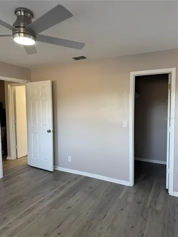 a view of a backyard with sitting area