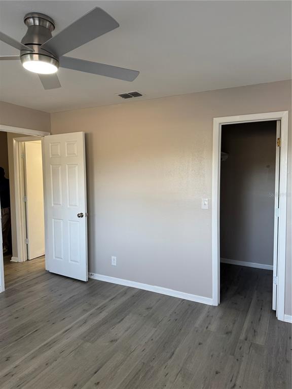 4550 Ewell Road Lakeland, FL 33811 - Photo 36 of 49 a view of an empty room and wooden floor