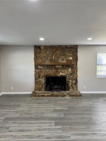 a living room with a fireplace