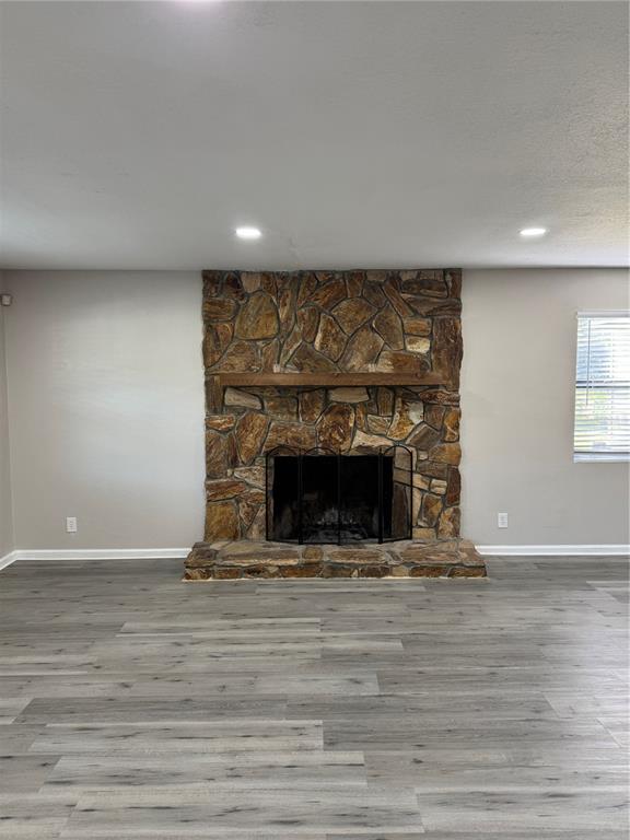 4550 Ewell Road Lakeland, FL 33811 - Photo 5 of 49 a living room with a fireplace