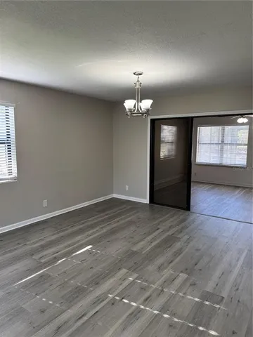 an empty room with a fireplace