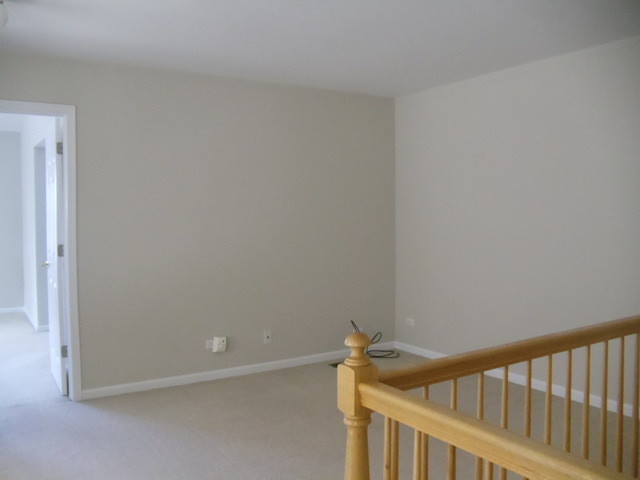 2977 Falling Waters Lane, Unit 2977 Lindenhurst, IL 60046 - Photo 11 of 25 a view of a hallway