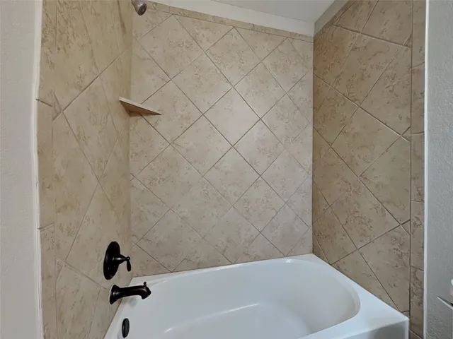 a bathroom with a bathtub
