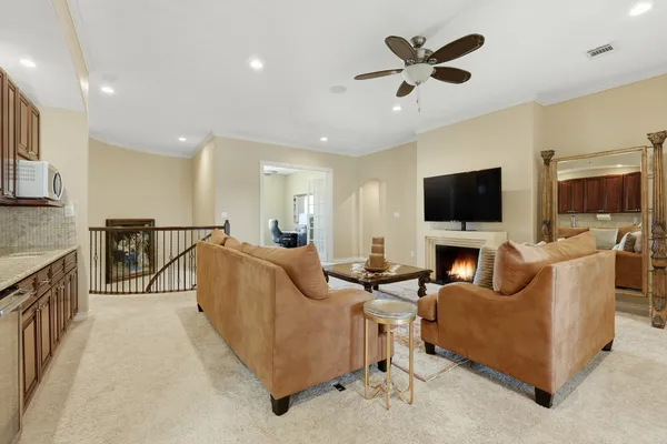 a kitchen with stainless steel appliances granite countertop wooden cabinets a sink and dishwasher
