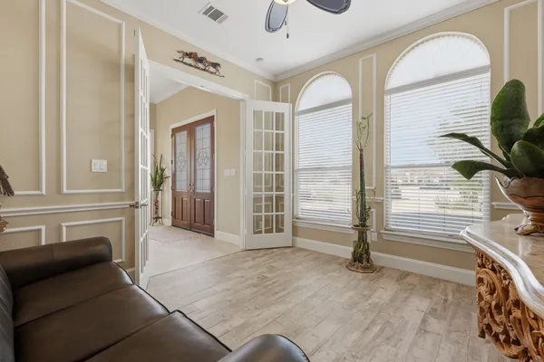 a view of a dining room with furniture window and outside view