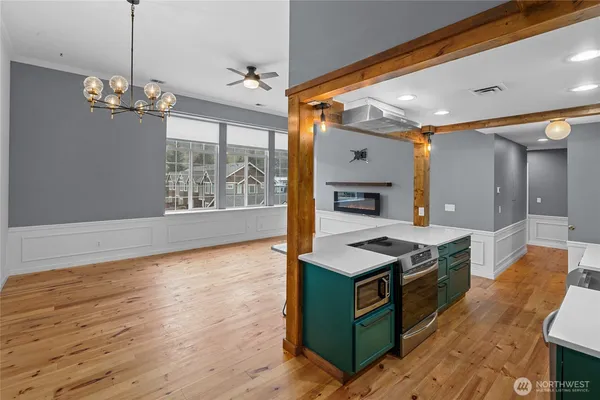 a kitchen that has a lot of cabinets in it