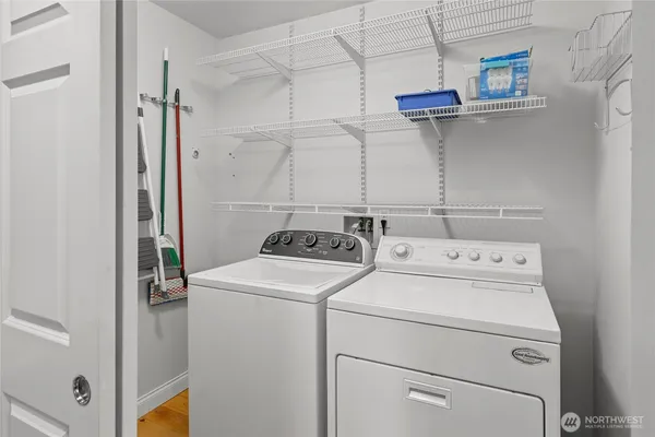 a utility room with dryer and washer