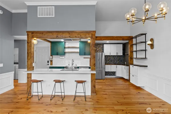 a view of living room and kitchen with furniture