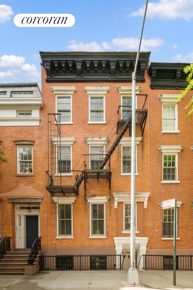 21 Bethune Street, Unit GARDEN Manhattan, NY 10014 - Photo 7 of 8 a view of a building with a street