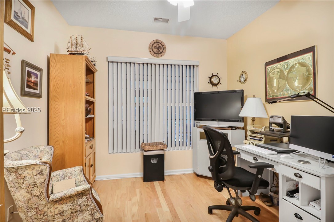 22 Sundome Court Bluffton, SC 29909 - Photo 22 of 30 Den hardwood floors