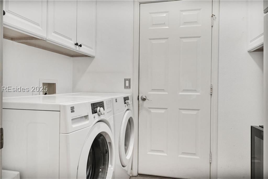 22 Sundome Court Bluffton, SC 29909 - Photo 24 of 35 Laundry room with cabinets