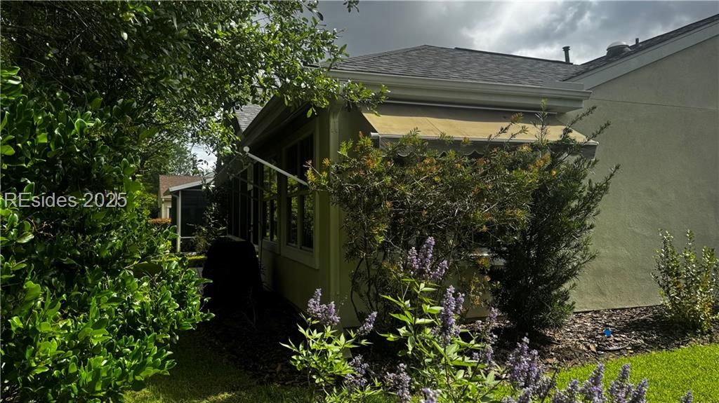 22 Sundome Court Bluffton, SC 29909 - Photo 29 of 35 2 power awnings.