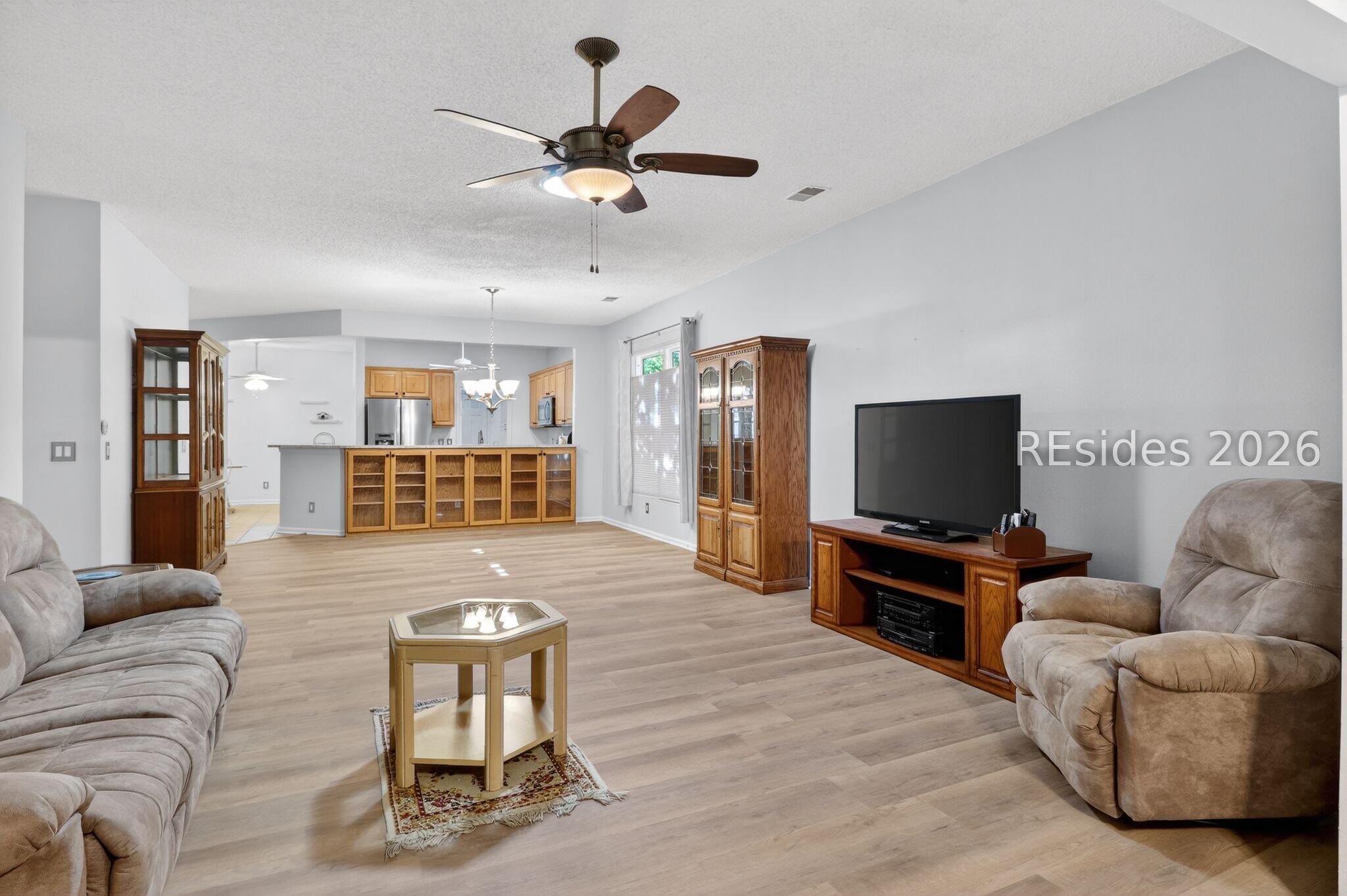 22 Sundome Court Bluffton, SC 29909 - Photo 33 of 35 New 2026 LVP floors in the Great room-dining area