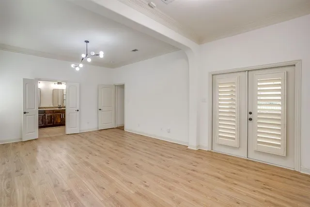 a bathroom with a double vanity sink and mirror