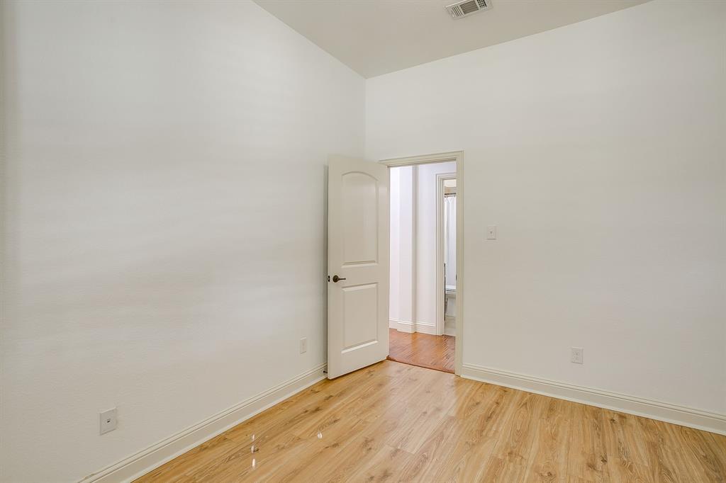 3009 Montebello Drive Denton, TX 76210 - Photo 30 of 38 a view of an empty room and wooden floor