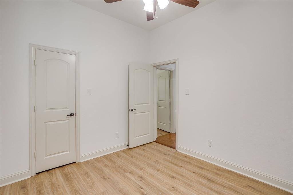 3009 Montebello Drive Denton, TX 76210 - Photo 33 of 38 a view of an empty room and wooden floor